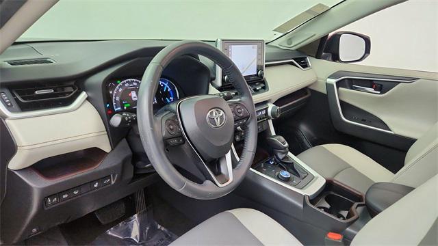 used 2019 Toyota RAV4 Hybrid car, priced at $22,877