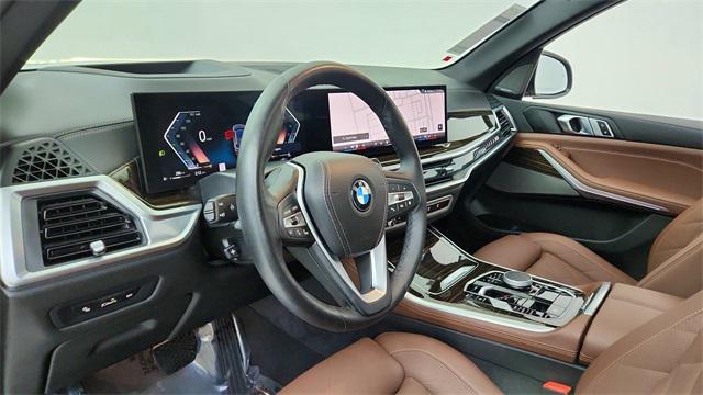 used 2026 BMW X5 car, priced at $56,950