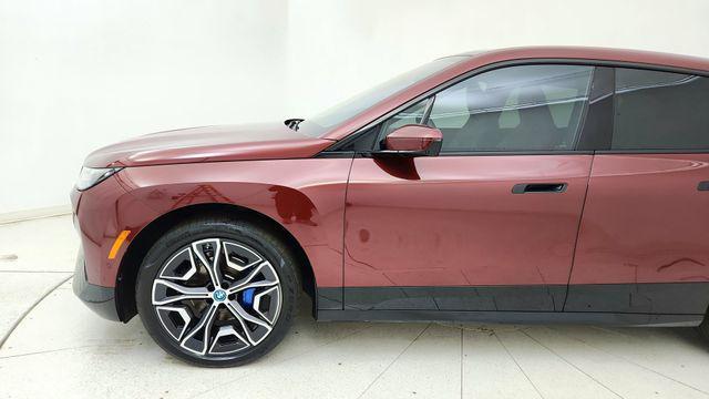 used 2024 BMW iX car, priced at $55,450