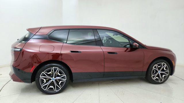 used 2024 BMW iX car, priced at $55,450