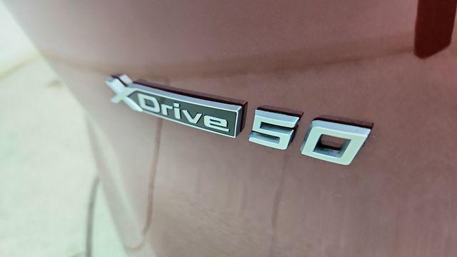 used 2024 BMW iX car, priced at $55,450