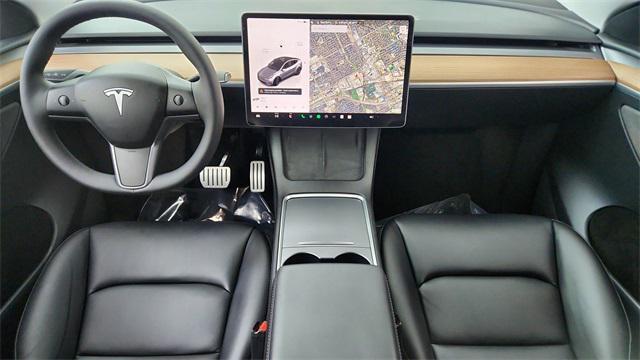used 2025 Tesla Model Y car, priced at $42,450