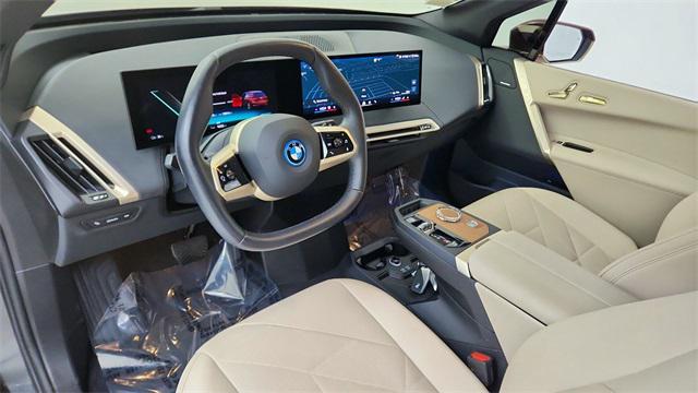 used 2025 BMW iX car, priced at $51,750