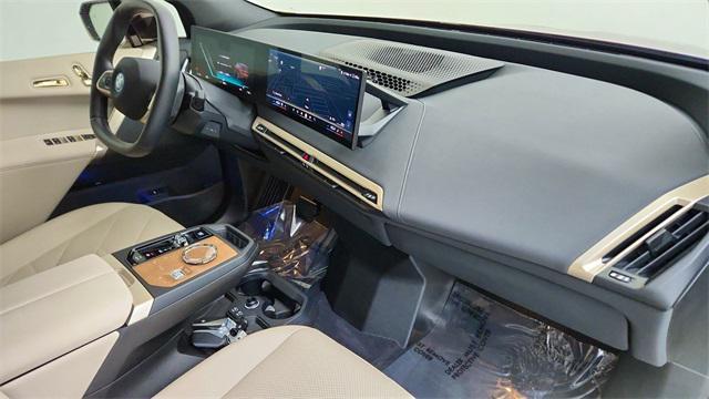 used 2025 BMW iX car, priced at $51,750