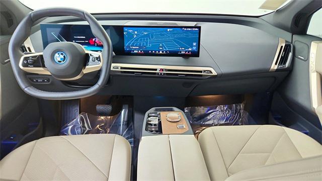used 2025 BMW iX car, priced at $51,750