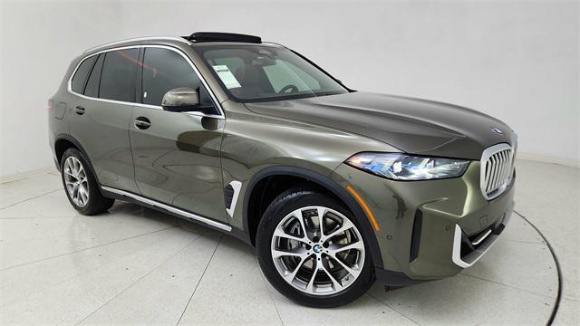 used 2026 BMW X5 car, priced at $56,450
