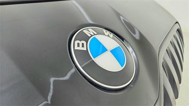used 2024 BMW 740 car, priced at $71,750