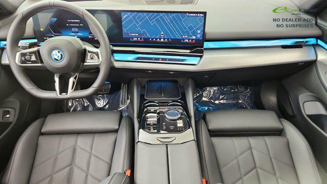 used 2026 BMW i5 car, priced at $55,950