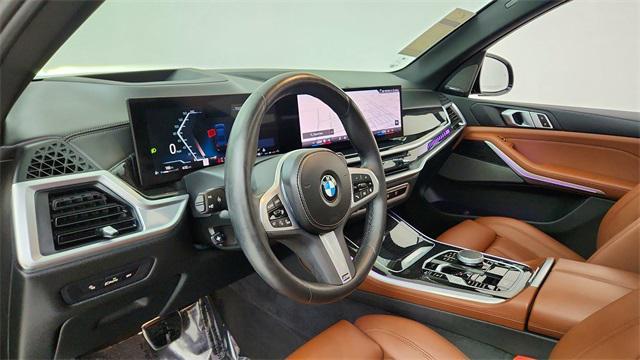 used 2024 BMW X5 car, priced at $58,450