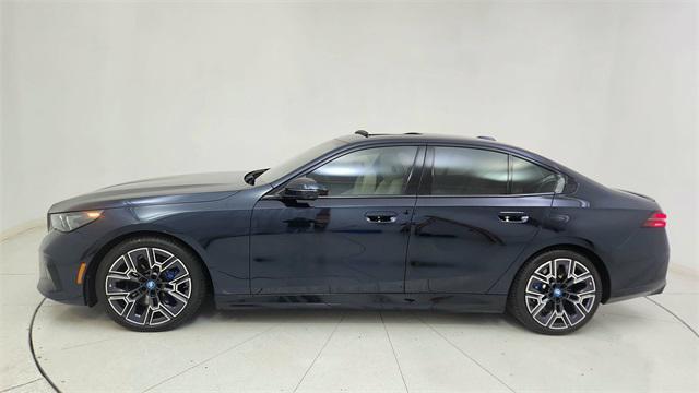 used 2025 BMW i5 car, priced at $57,950