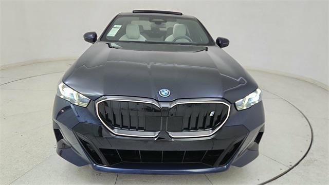 used 2025 BMW i5 car, priced at $57,950