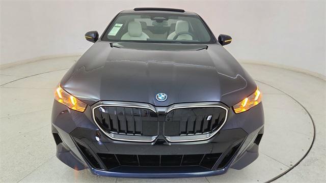 used 2025 BMW i5 car, priced at $57,950