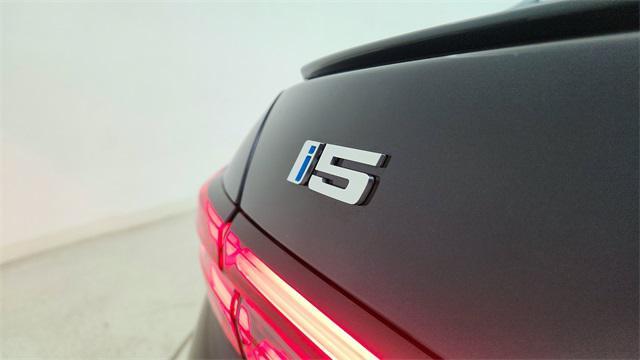used 2025 BMW i5 car, priced at $57,950
