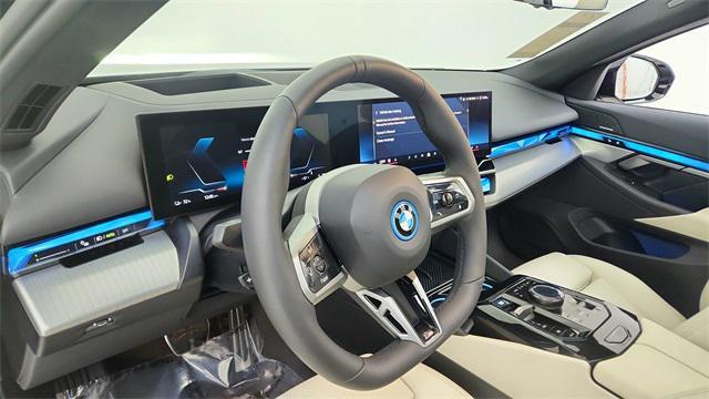 used 2025 BMW i5 car, priced at $57,950