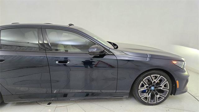 used 2025 BMW i5 car, priced at $57,950