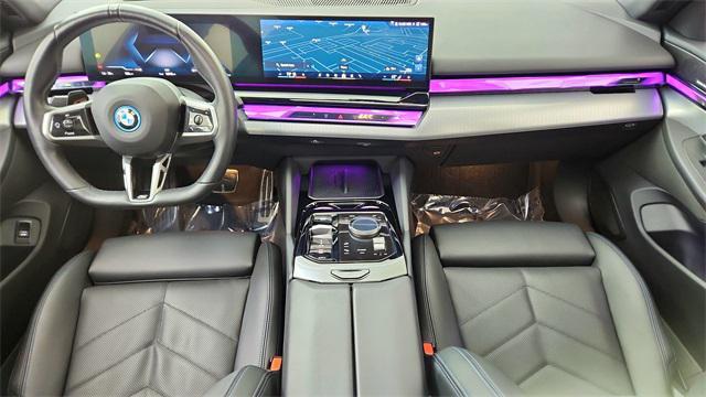 used 2025 BMW i5 car, priced at $57,850
