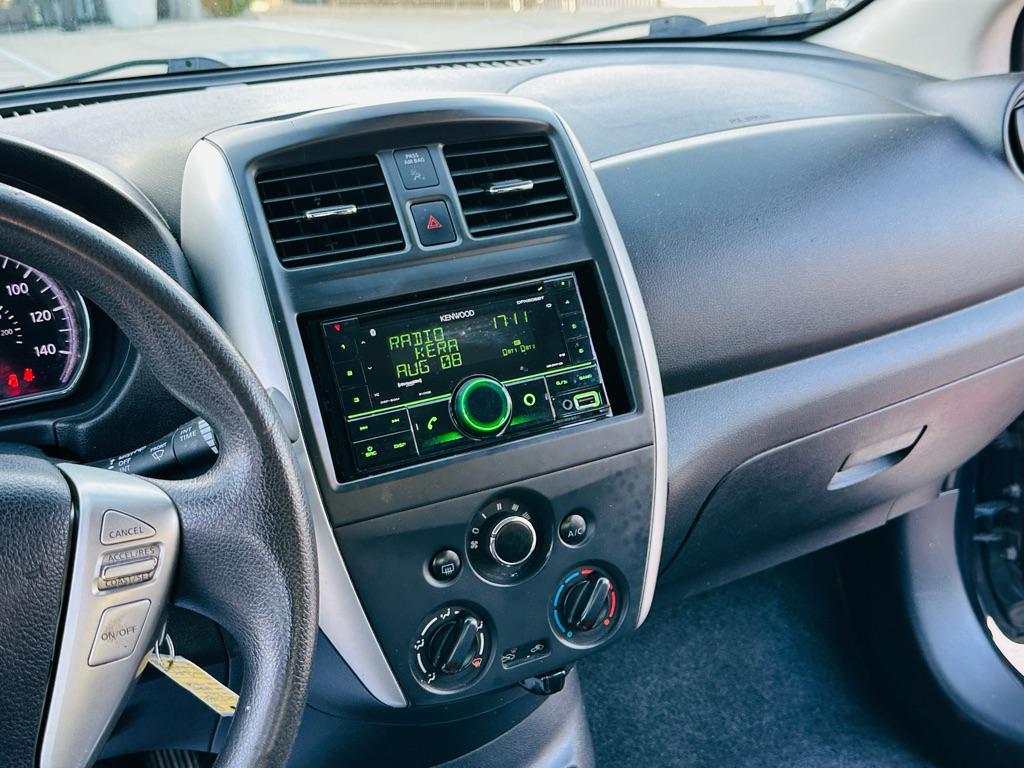 used 2015 Nissan Versa car, priced at $5,990