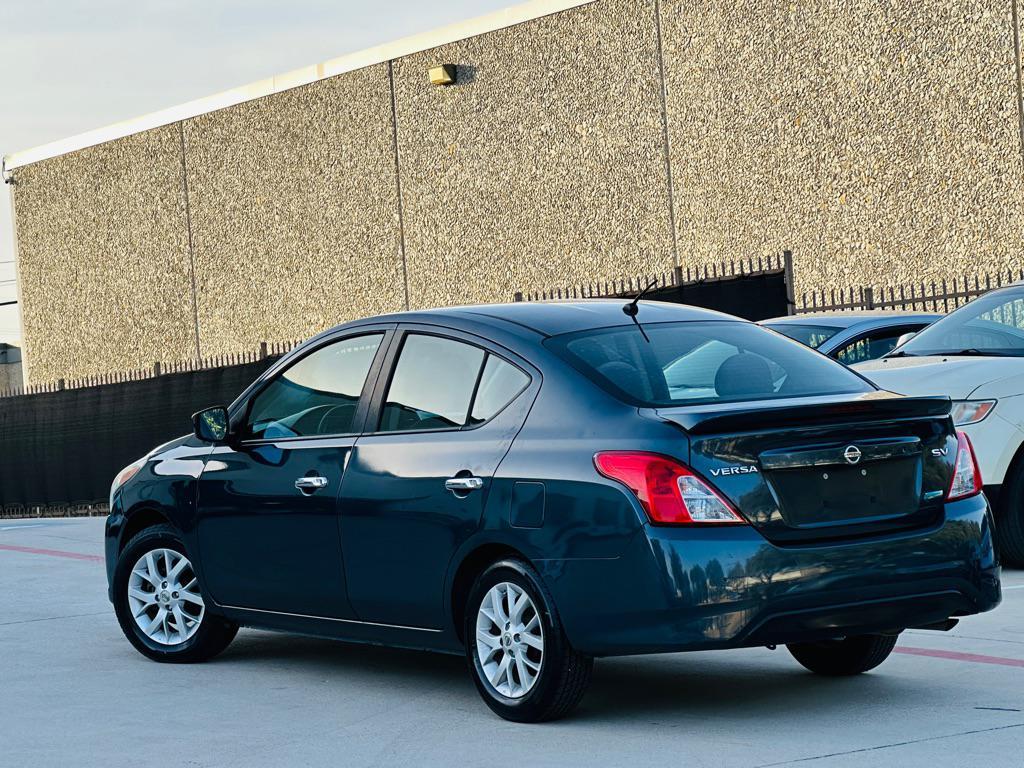 used 2015 Nissan Versa car, priced at $5,990