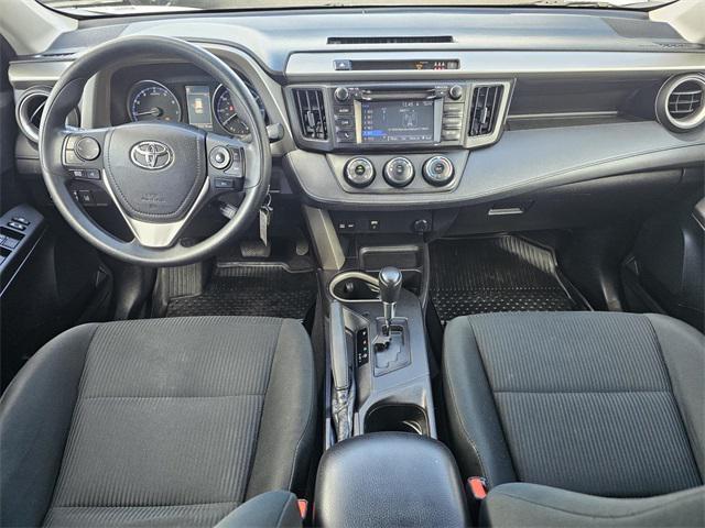 used 2018 Toyota RAV4 car, priced at $14,000