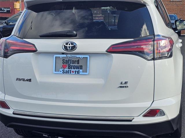 used 2018 Toyota RAV4 car, priced at $14,000