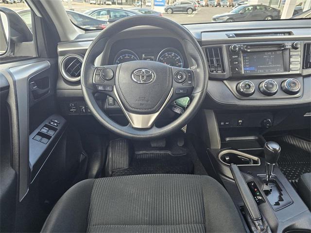 used 2018 Toyota RAV4 car, priced at $14,000