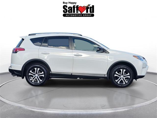 used 2018 Toyota RAV4 car, priced at $14,000