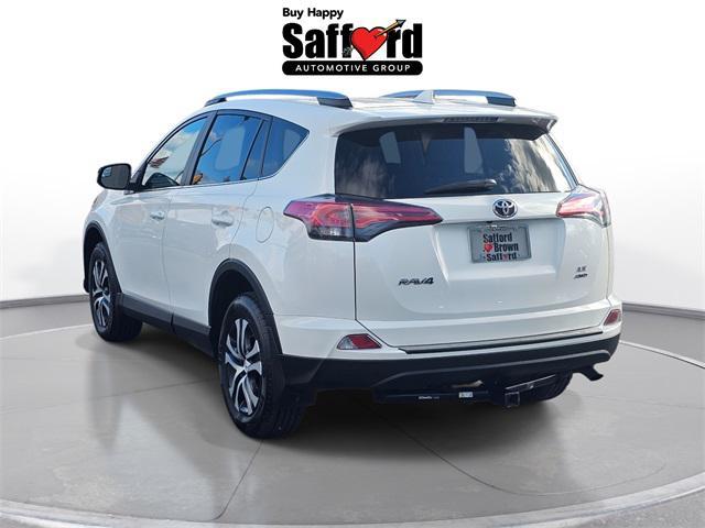 used 2018 Toyota RAV4 car, priced at $14,000