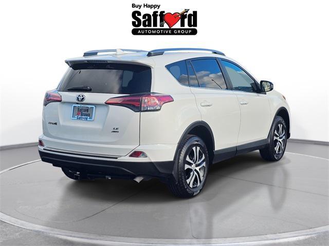 used 2018 Toyota RAV4 car, priced at $14,000