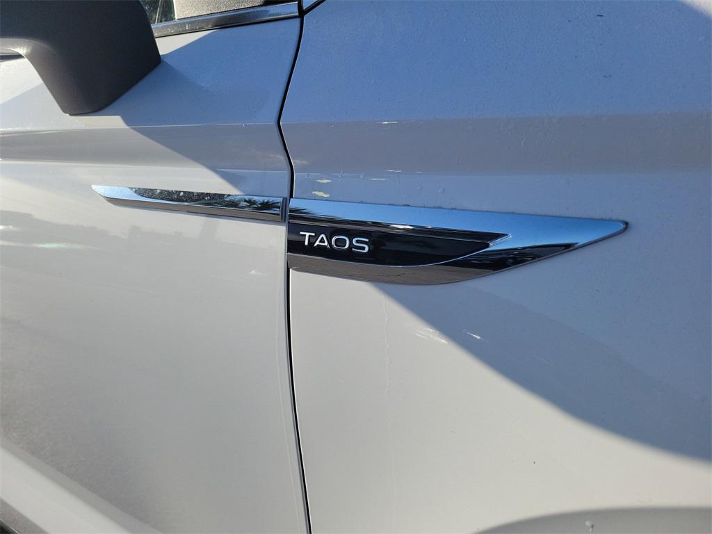 used 2022 Volkswagen Taos car, priced at $16,990