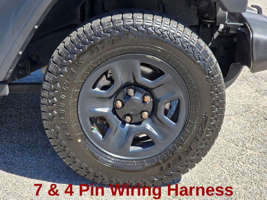 used 2023 Jeep Wrangler car, priced at $28,665
