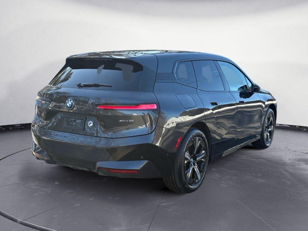 used 2024 BMW iX car, priced at $49,500