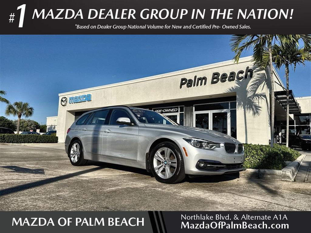 used 2018 BMW 330 car, priced at $23,497