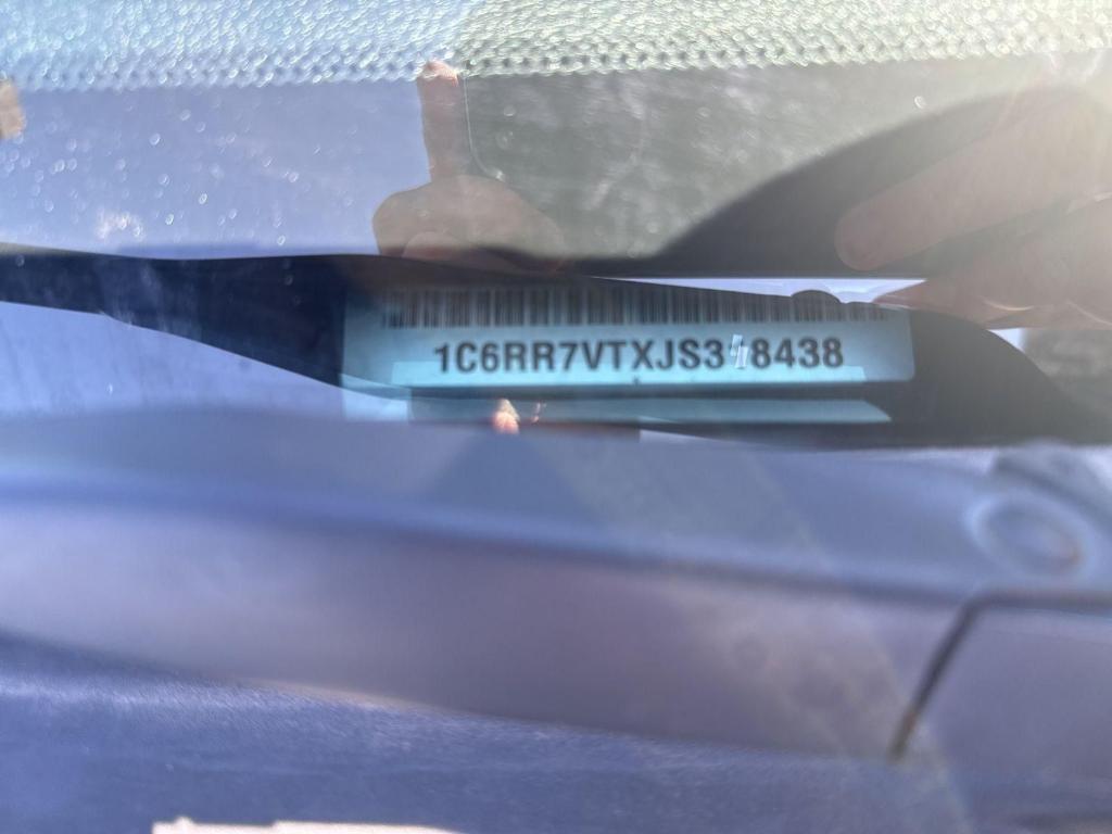 used 2018 Ram 1500 car, priced at $23,997