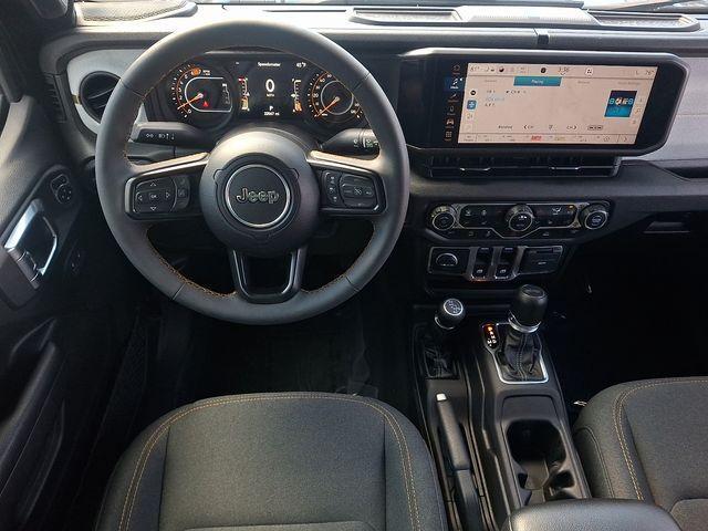 used 2024 Jeep Wrangler car, priced at $29,341