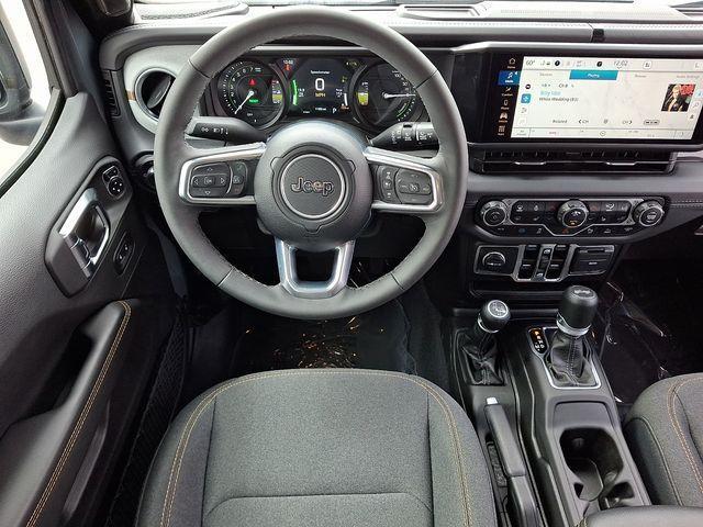 used 2025 Jeep Wrangler 4xe car, priced at $33,641