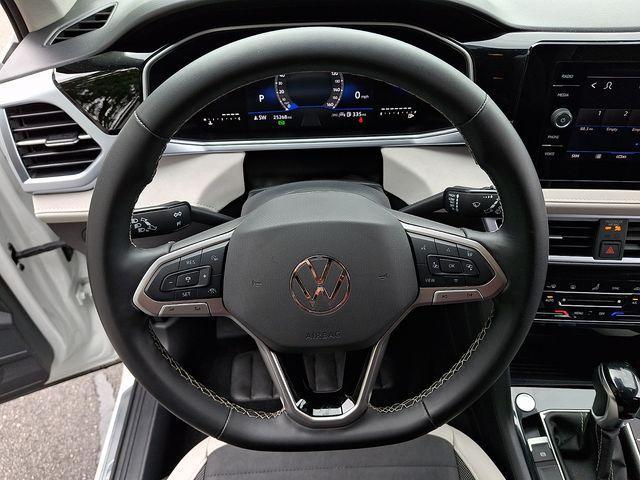 used 2025 Volkswagen Taos car, priced at $23,981