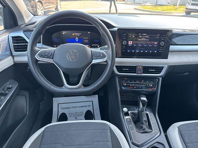 used 2025 Volkswagen Taos car, priced at $24,591