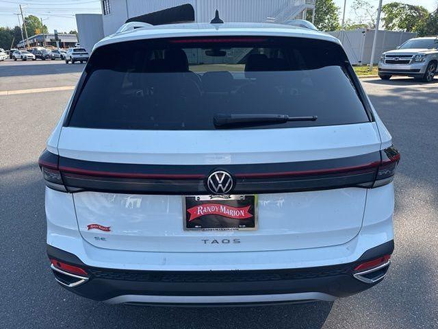 used 2025 Volkswagen Taos car, priced at $24,591