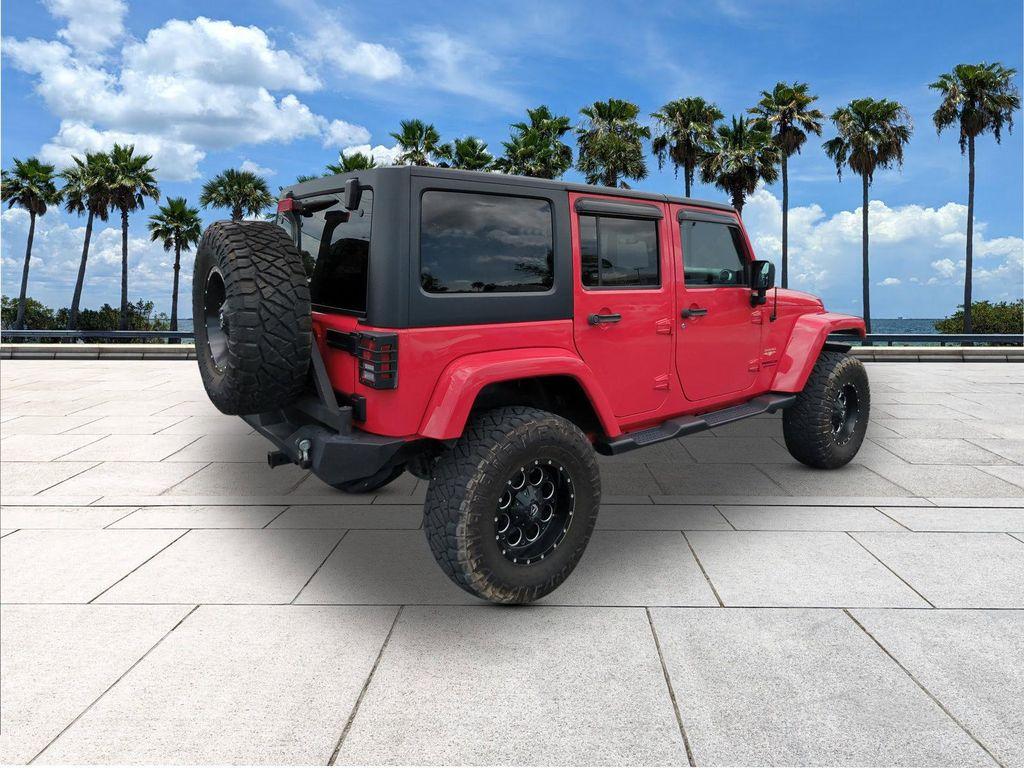 used 2015 Jeep Wrangler Unlimited car, priced at $22,084