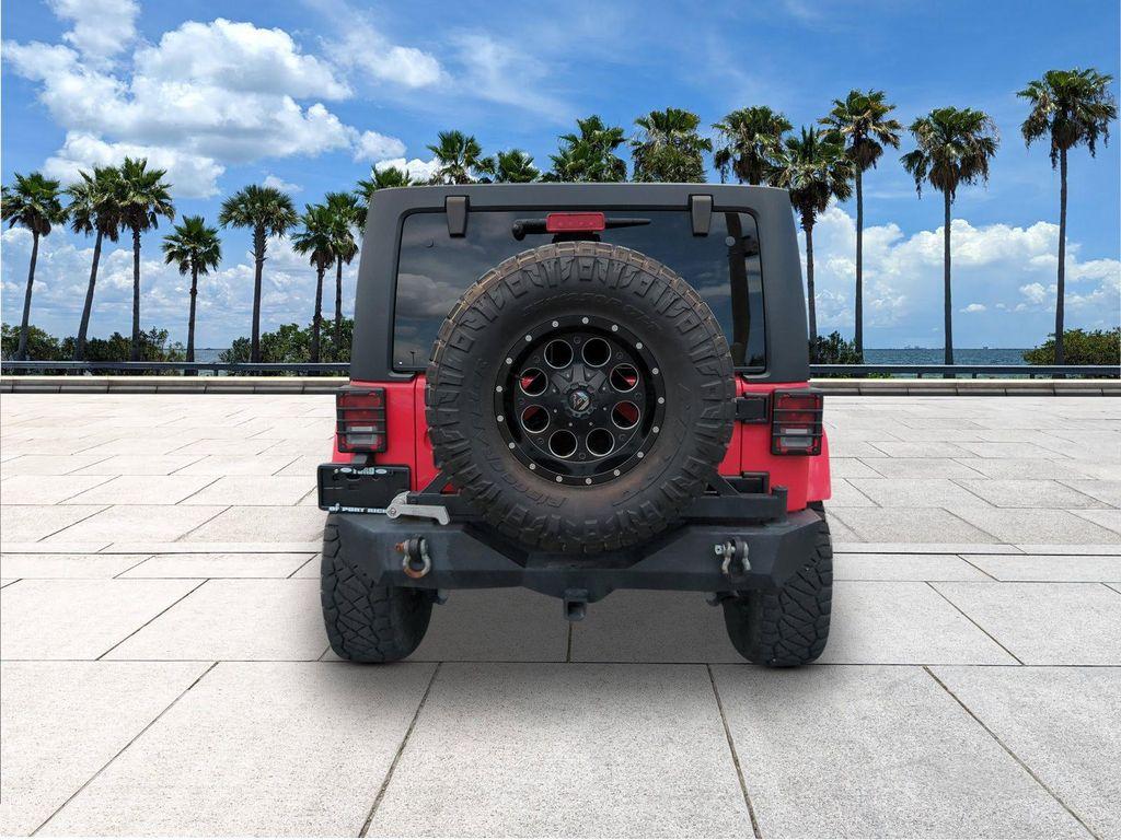 used 2015 Jeep Wrangler Unlimited car, priced at $22,084