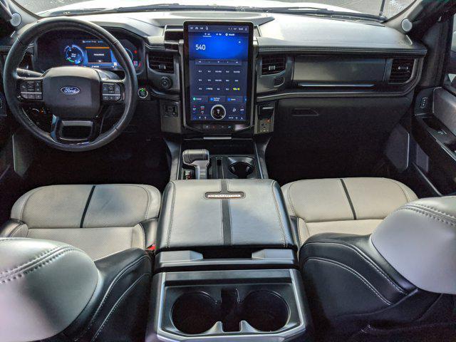 used 2024 Ford F-150 Lightning car, priced at $59,009