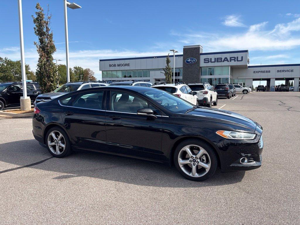 used 2016 Ford Fusion car, priced at $11,299