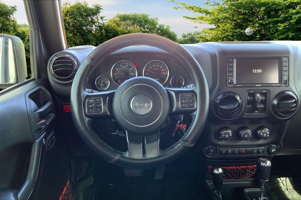 used 2017 Jeep Wrangler Unlimited car, priced at $23,321