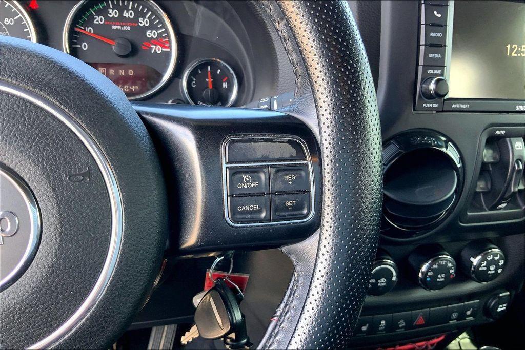 used 2017 Jeep Wrangler Unlimited car, priced at $23,321