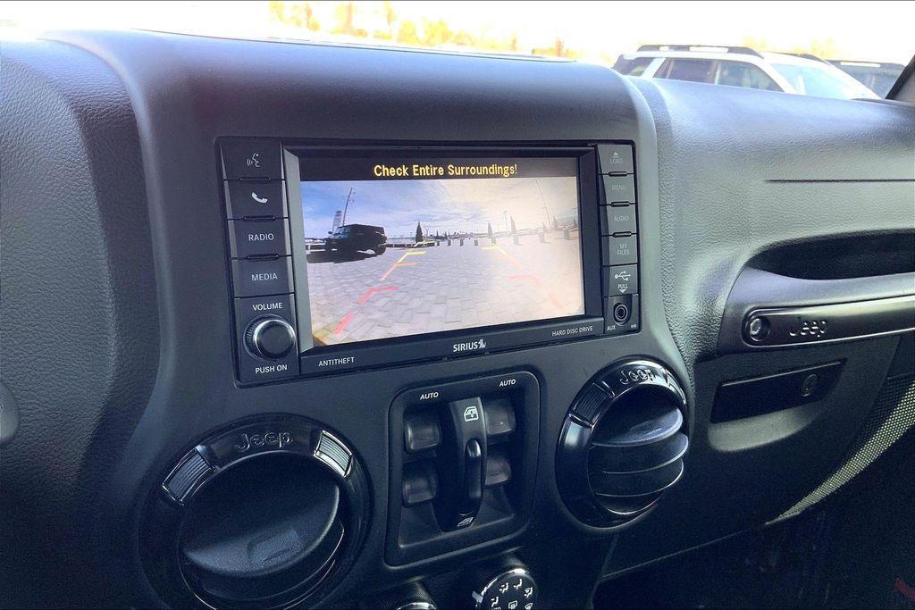 used 2017 Jeep Wrangler Unlimited car, priced at $23,321