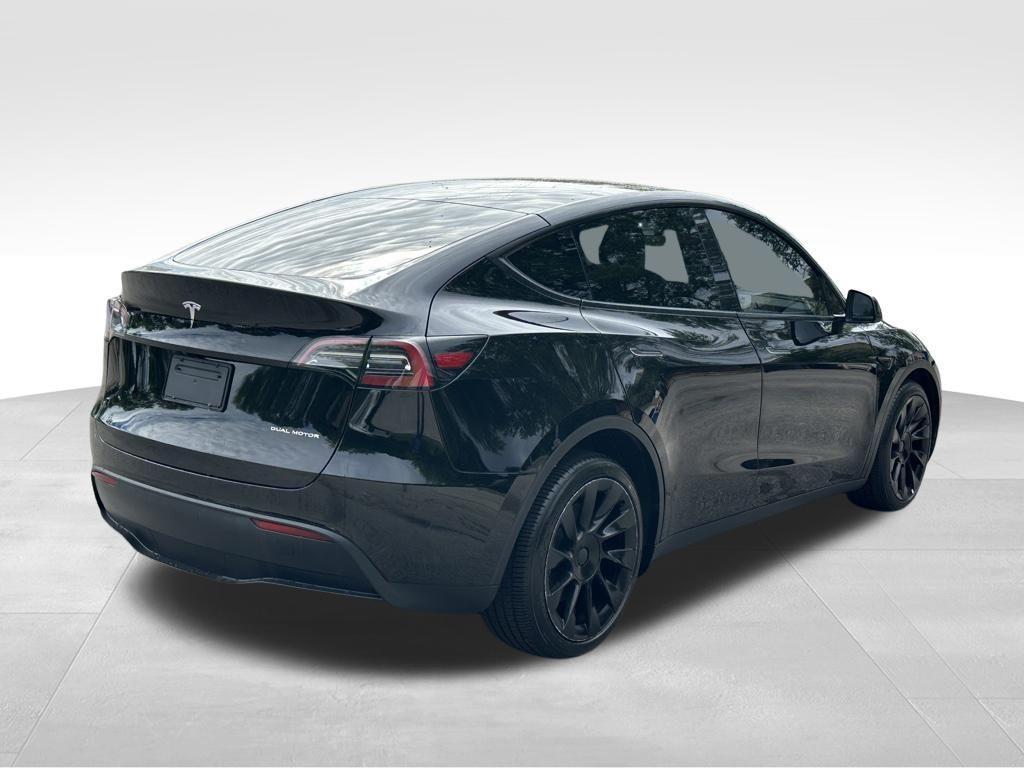 used 2023 Tesla Model Y car, priced at $30,392