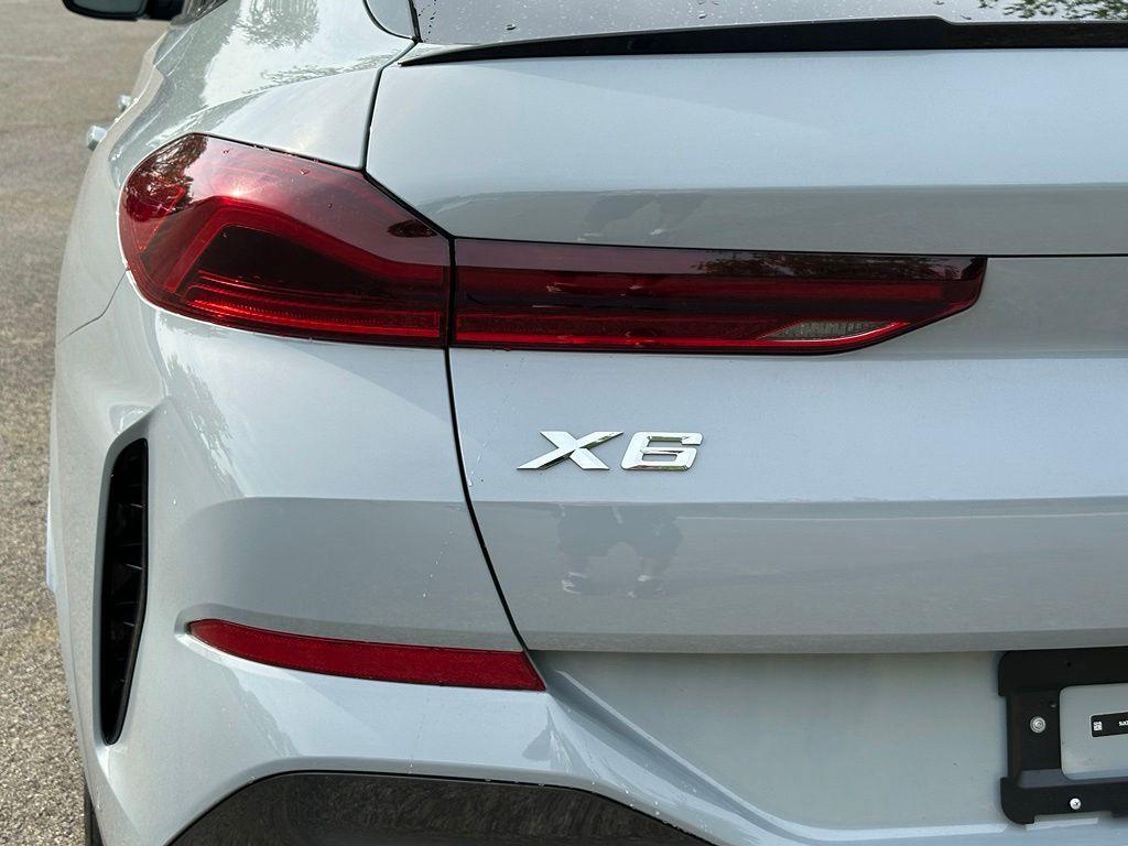 used 2025 BMW X6 car, priced at $67,298