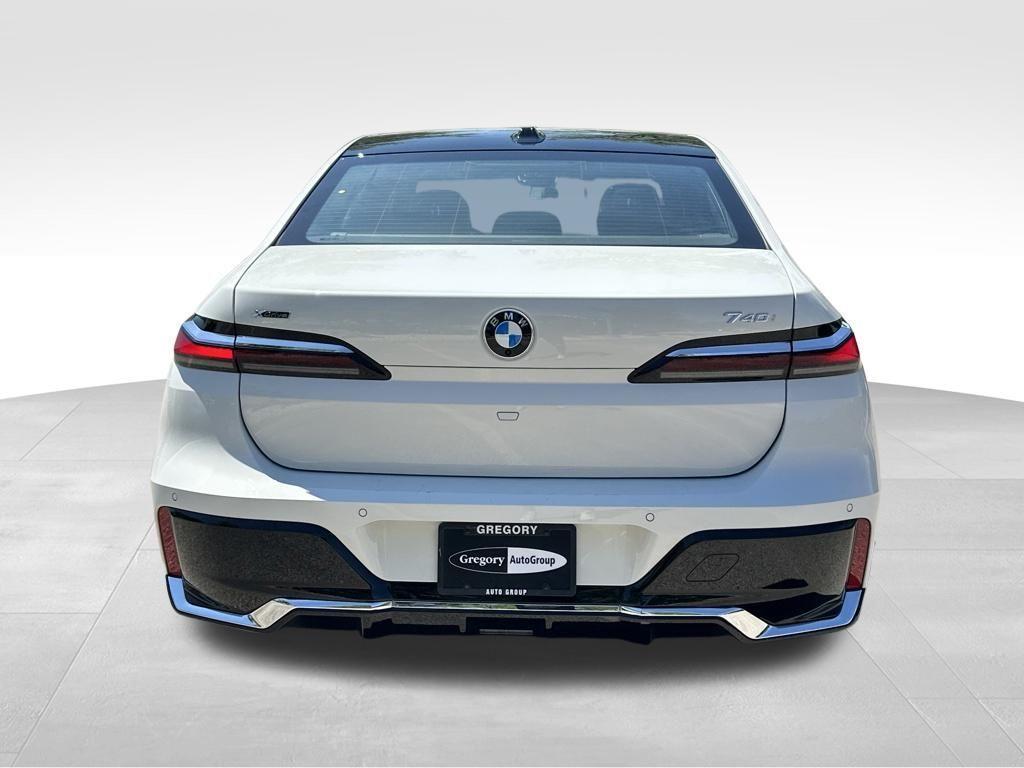 used 2025 BMW 740 car, priced at $73,298
