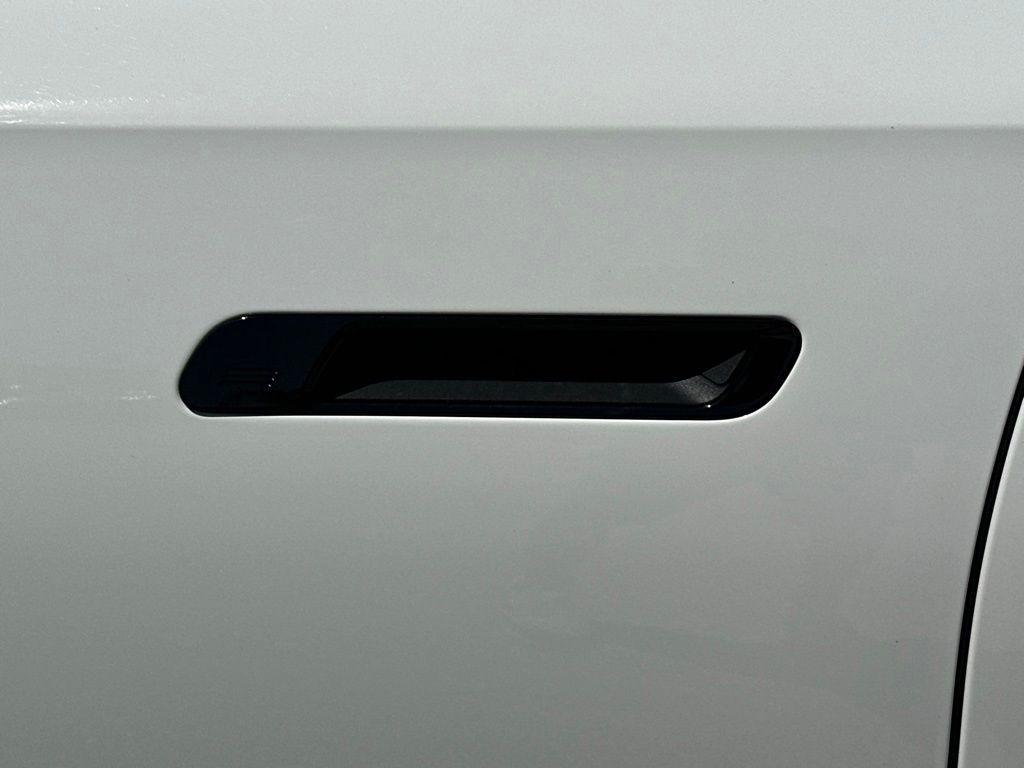 used 2025 BMW 740 car, priced at $73,298