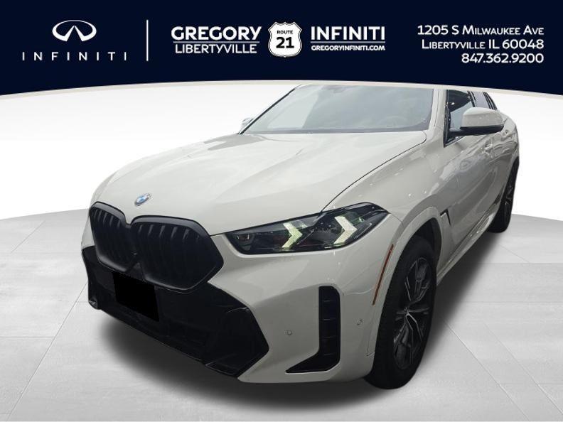 used 2025 BMW X6 car, priced at $62,886